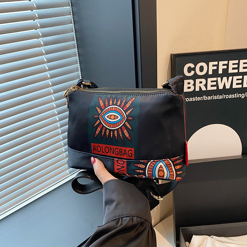 Naisten monitaskuinen painettu ristikkolaukku