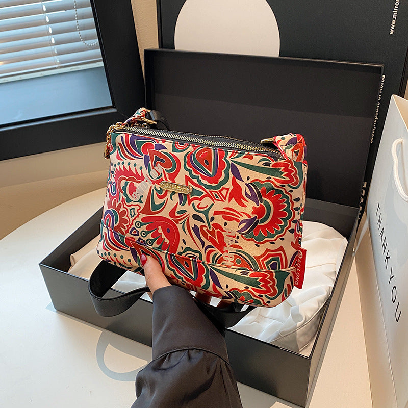 Naisten monitaskuinen painettu ristikkolaukku