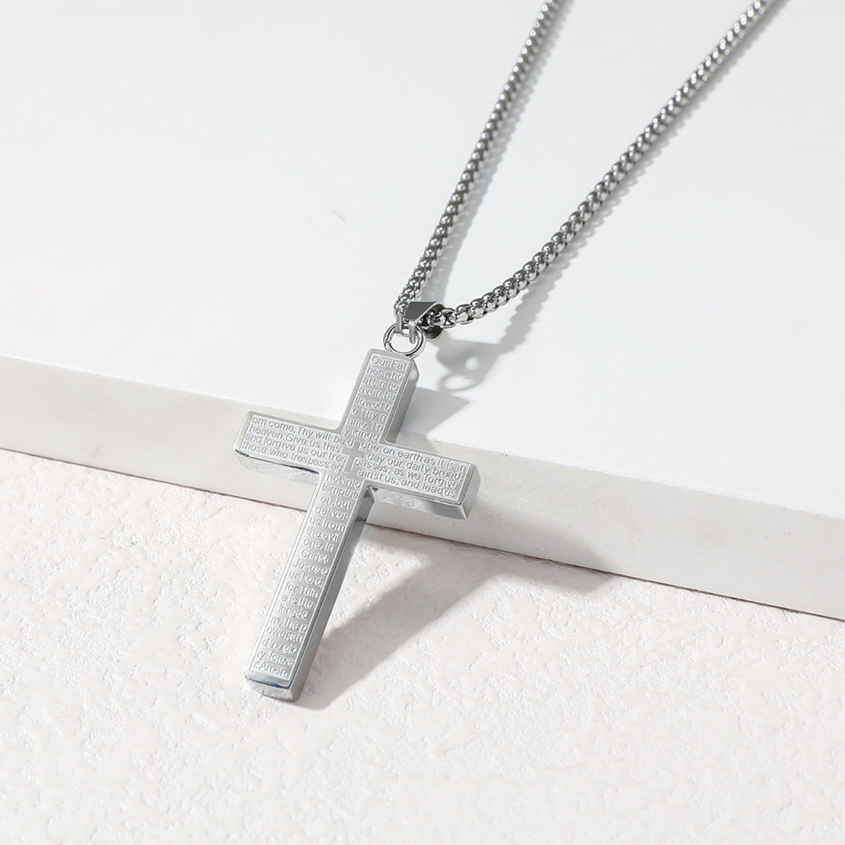 Cross-shaped pendant