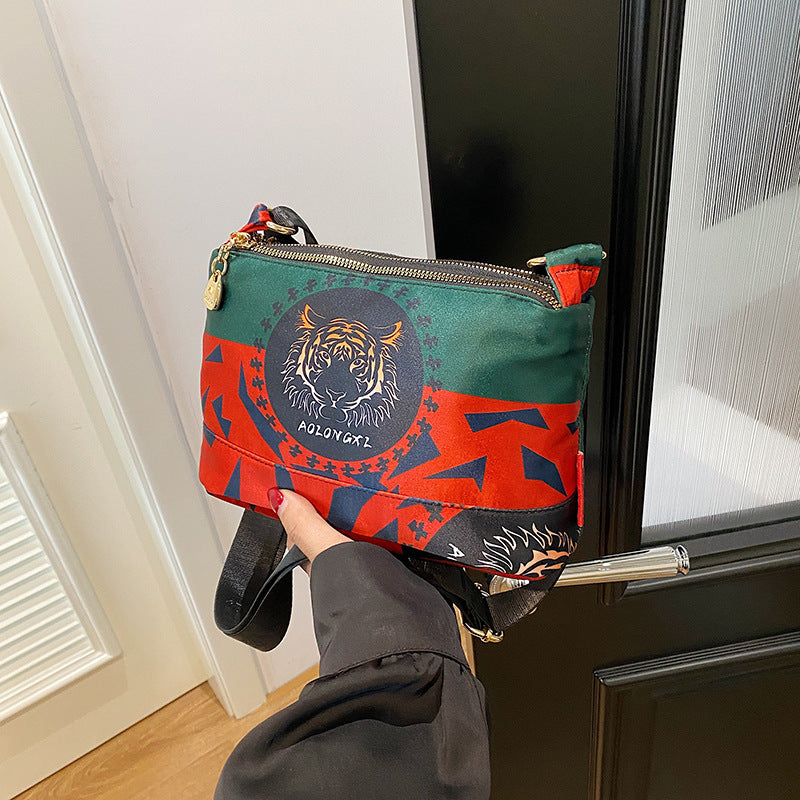 Naisten monitaskuinen painettu ristikkolaukku