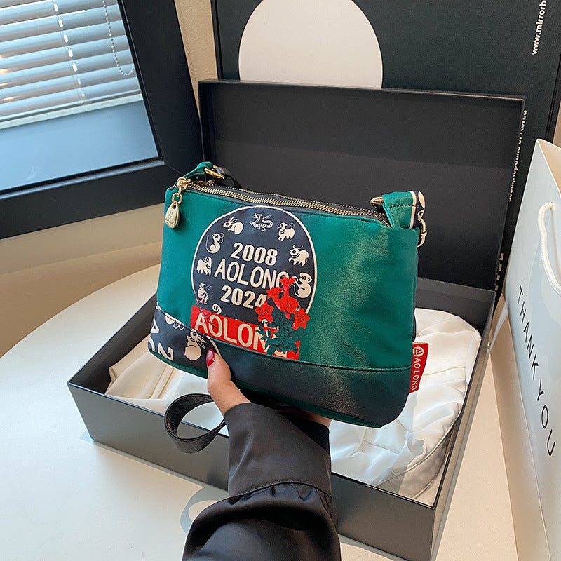 Naisten monitaskuinen painettu ristikkolaukku